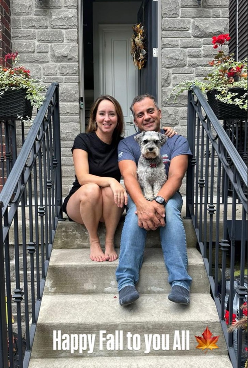 Marco Martins at home in Davenport with his partner and their dog